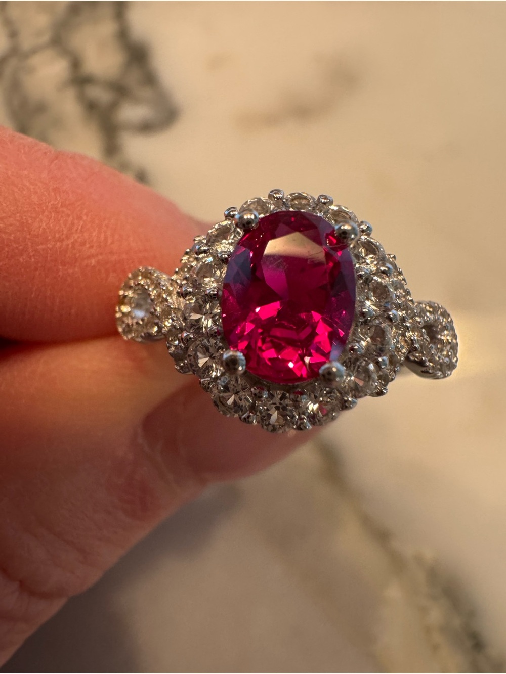 Women's Sterling Silver Ring with Ruby Oval Center Stone and Halo